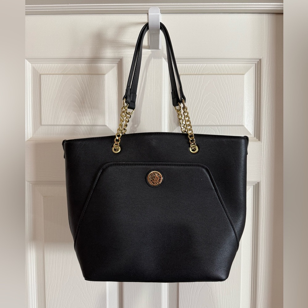 Black Anne Klein Bag with Gold Accents and Polka Dot Lining